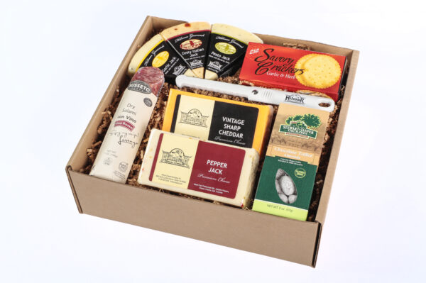 Cheeses and assorted gourmet foods in gift box