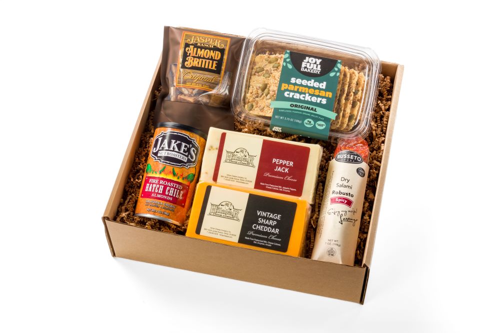 gift box with two cheeses, nuts, salami and crackers